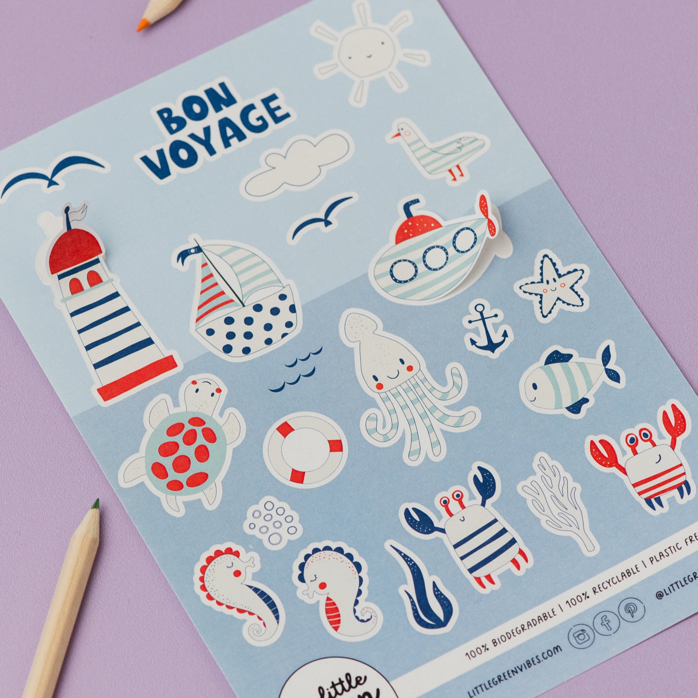 Sheet of 'Bon Voyage' themed stickers with sea-themed illustrations on a purple background.