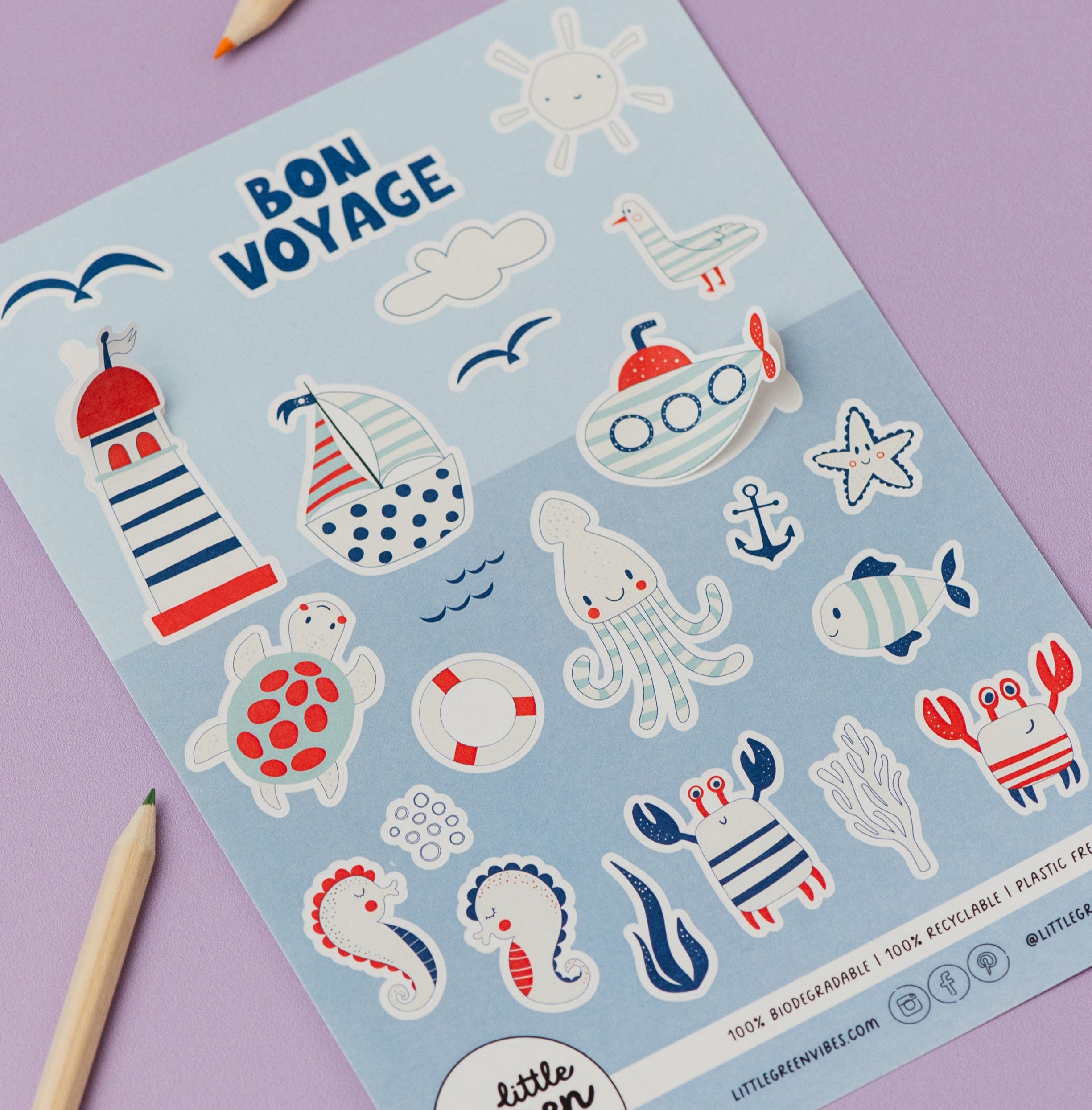 Sheet of 'Bon Voyage' themed stickers with sea-themed illustrations on a purple background.