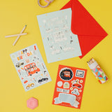 Car Sticker sheets and a red envelope on a yellow background