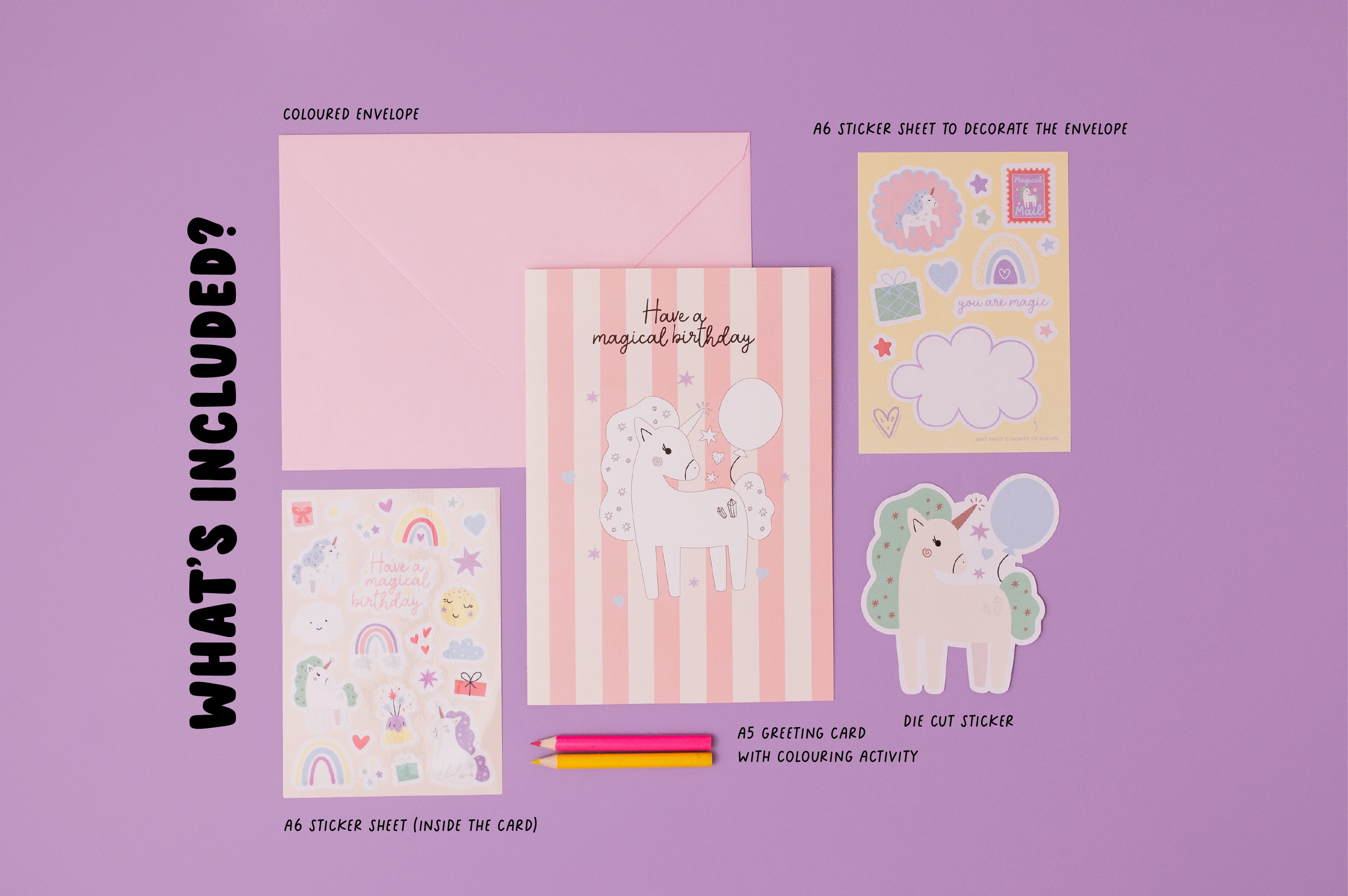 Personalised Magical Birthday Unicorn Sticker & Colouring Kids Birthday Card displayed with matching sticker sheets featuring cute unicorns, rainbows, and stars on pink striped background. Set includes coloring pencils and activity sheets arranged on purple surface.
